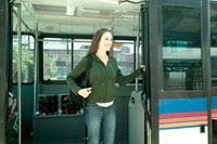 girl getting off bus