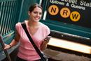  Photo of a woman exiting Subway walking up the stairs.