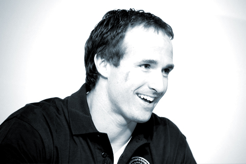 Image of Drew Brees speaking at an event