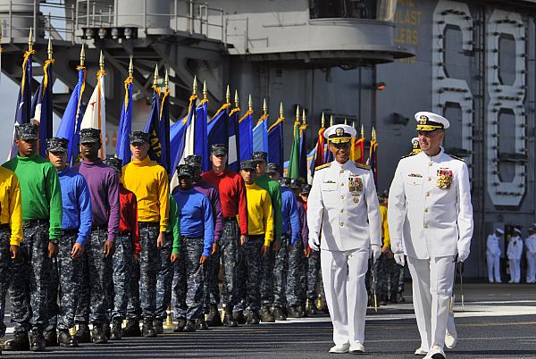 Adm. Cecil E. Haney, commander of the U.S. Pacific Fleet, and Vice Adm. David H. Buss arrive at a change of command ceremony aboard the aircraft carrier USS Nimitz (CVN 68). Buss relieved Vice Adm. Allen G. Myers as commander of Naval Air Forces. Naval Air Forces mans, trains, equips and maintains a worldwide naval air force that is reliable, flexible and ready. America's Sailors are Warfighters, a fast and flexible force deployed worldwide. Join the conversation on social media using #warfighting.  U.S. Navy photo by Mass Communication Specialist 3rd Class Nicolas C. Lopez (Released)  121004-N-GZ277-223