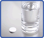glass of water with one aspirin