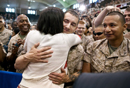 Woman hugging soldier