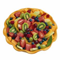 Photograph of a bowl of cut fresh fruit