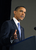 a photo of President Obama speaking at a podium.