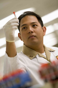 Scientist examining a sample