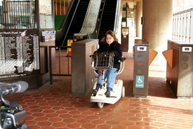 Woman Driving a Mobility Scooter