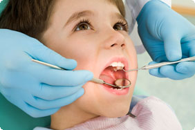 Little Boy Getting Teeth Examination