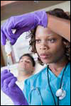 Photo: A healthcare professional preparing to vaccinate a patient.