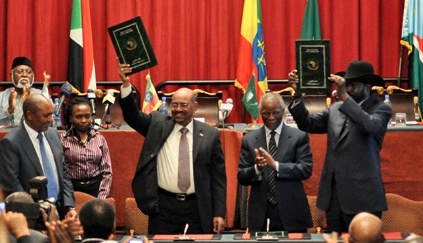 Sudan's President Omar al-Bashir, center-left, and South Sudan's President Salva Kiir, right.