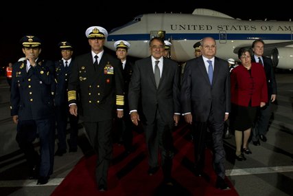 U.S. Defense Secretary Leon E. Panetta walks with Peruvian Minister of Defense Pedro Cateriano Bellido, right, Peruvian Navy Adm. Jose E. Cueto Aservi, left, and U.S. Ambassador Rose Likins, far right, upon Panetta's arrival in Lima, Peru, Oct. 5, 2012. Panetta is visiting counterparts in South America on a four-day trip to the region.