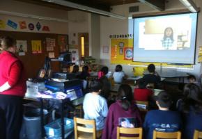 A class from Angoon City School watches a Digital Storytelling presentation