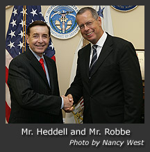 Photo of Mr. Heddell and Mr. Robbe