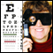 Image of a woman undergoing visual acuity assessment 
