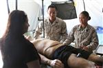 Petty Officer 2nd Class Anthony Chow and Petty Officer 2nd Class Tara Mallari, corpsmen serving with 1st Medical Battalion, instruct how to properly treat casualties of a natural disaster during San Francisco Fleet Week Oct. 3. Fleet Week is dedicated to showing civilians the United States military's capability of humanitarian assistance and disaster response preparedness on the home front.