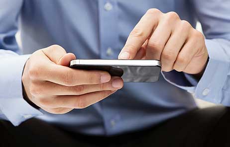 Man checking emergency alerts on his smartphone