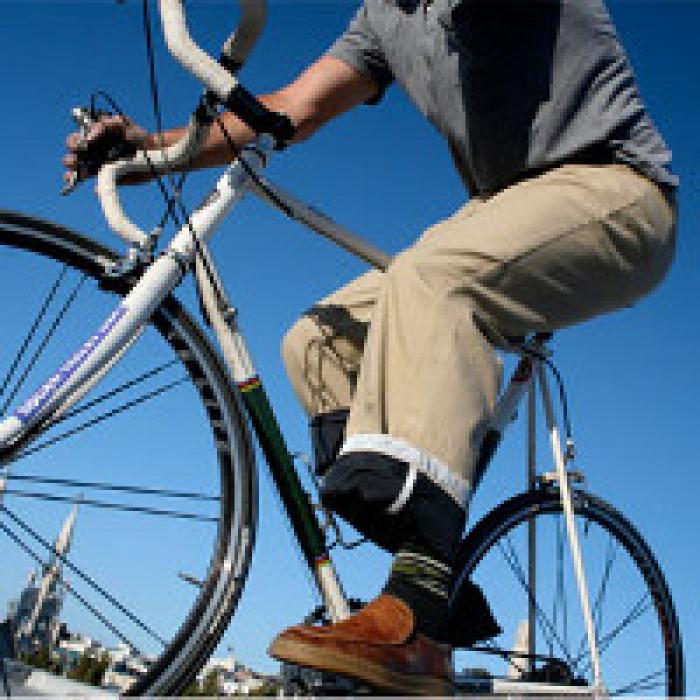 A commuter rides his bicycle to work.