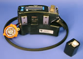 Photo of a person-wearable monitor that continually displays accurate dust exposure information to enable workers and management to react to changes in dust exposure.