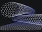 Image showing ball and stick model of two crossing carbon nanotubes on a graphite surface.