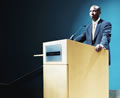 man at lectern