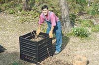 Image of man with compost bin