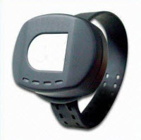 Small black ankle bracelet with attached electornic monitoring device