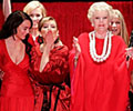 12 celebrity women in designer red dresses take a bow, blow kisses, wave and pose at the conclusion of The Heart Truth's Red Dress Collection Fashion show.