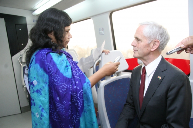 Secretary Bryson taking questions while riding the Delhi Metro