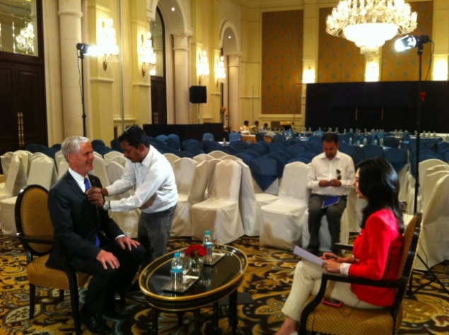 Secretary Bryson getting mic-ed up before his interview with India's CNBC18