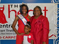 Champion Diann Holt poses with two other ladies in red at her Red Attire Gala heart healthy luncheon and health fair in Buffalo, NY.