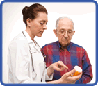 doctor showing pill instructions to patient