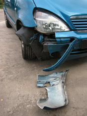 front of a damaged car