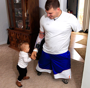 Soldier Who Lost 4 Limbs Readjusts to Life at Home