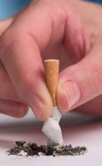 This photograph shows a cigarette being stubbed out.