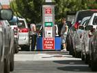 Image: Costco members fill up with discounted gasoline at a Costco gas station in Van Nuys, Calif.