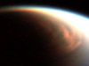 two views of Titan's giant north pole cloud
