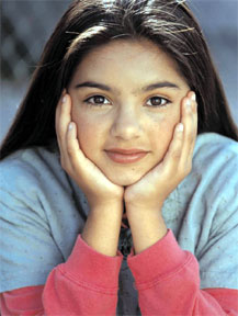 Photo of girl resting her head in her hands