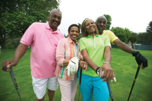 photo of a groupd of older people playing golf.