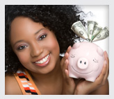 Girl with money on her piggy bank