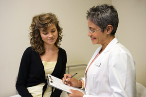 woman and doctor talking