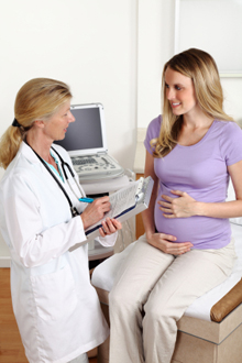 Photo of a doctor and pregnant woman