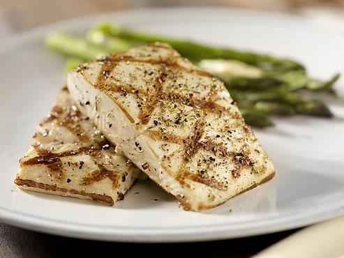 a plate of grilled fish