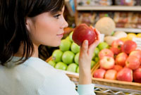 Woman holding an apple