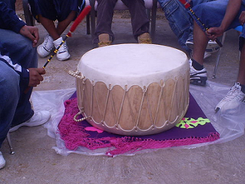 people hitting the drum