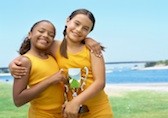 Two girls with trophy