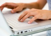 Woman's hands typing, computer, keyboard