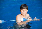 A child plays in the pool