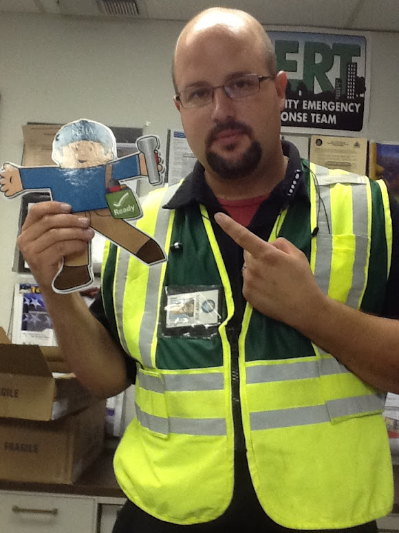 Flat Stanley with Emergency Operations Center representative.