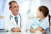 A doctor talks with a patient girl