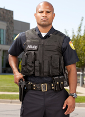 Policeman poses in full gear