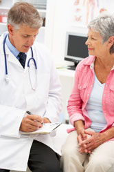 A doctor talks with his patient.